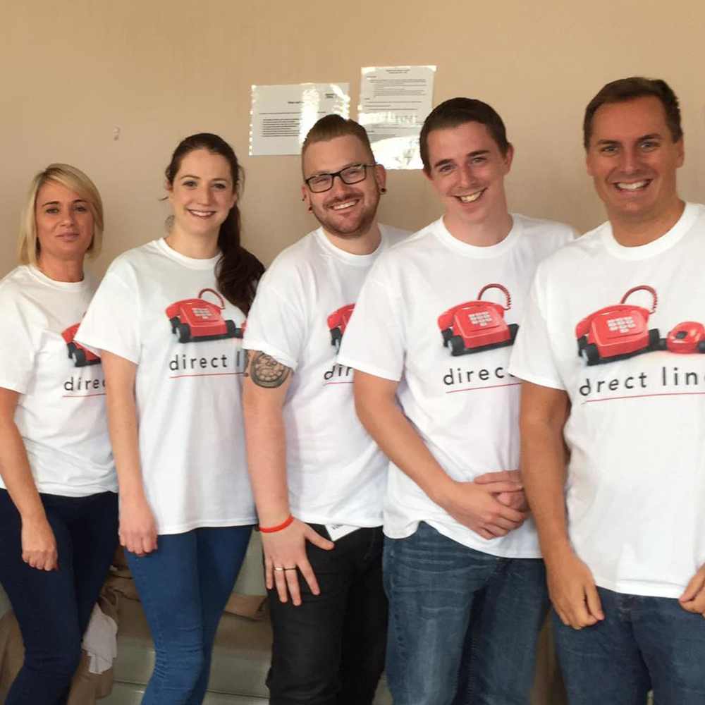 Team wearing their custom printed t-shirts